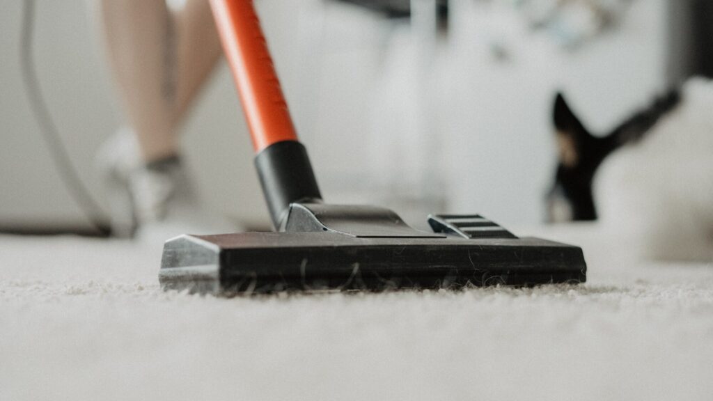 Cleaning home with vacuum cleaner